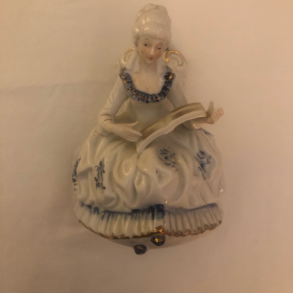 Elegant Porcelain Figurine with Blue and Gold Accents